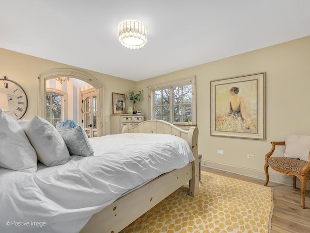 bedroom with light hardwood / wood-style flooring