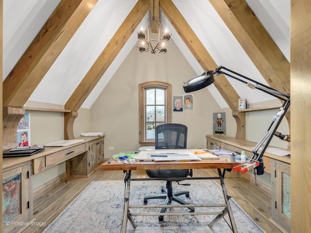 office area with an inviting chandelier, light hardwood / wood-style floors, and vaulted ceiling with beams