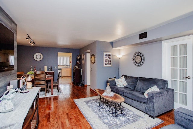 living room with wood-type flooring