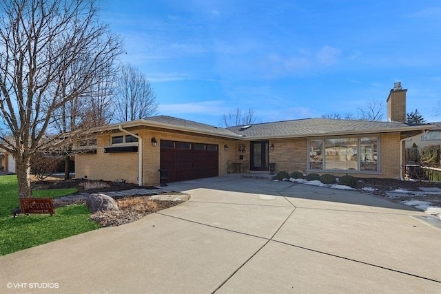 single story home featuring a garage