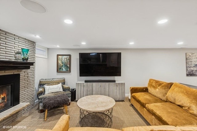 living room featuring light colored carpet and a brick fireplace