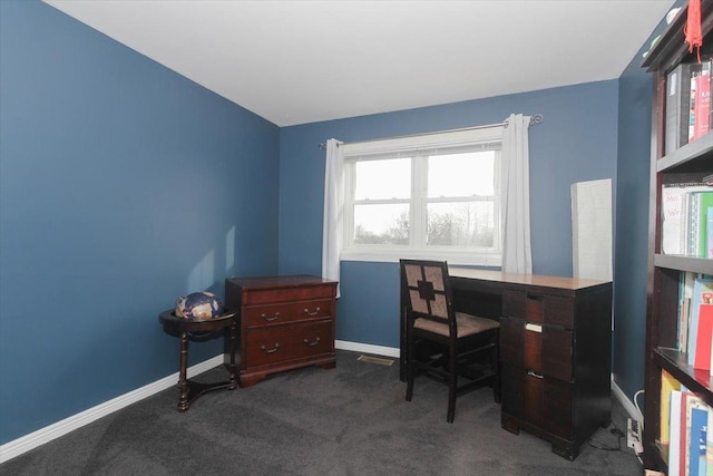 office area with dark colored carpet