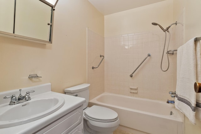 bathroom with vanity, toilet, and bathing tub / shower combination