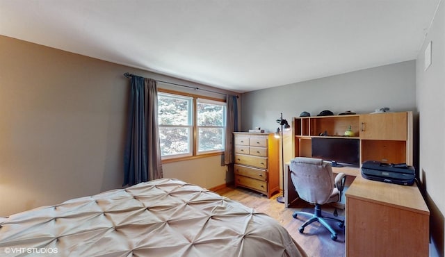 bedroom featuring light wood-type flooring