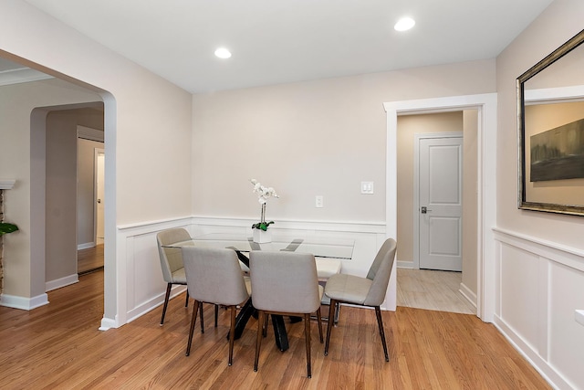 dining space with light wood-type flooring