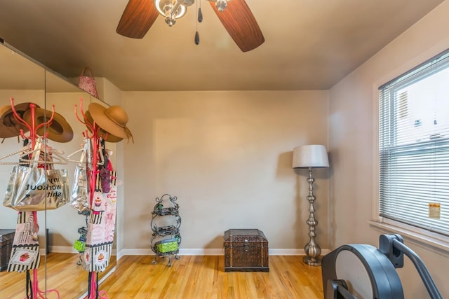 miscellaneous room featuring wood-type flooring and ceiling fan