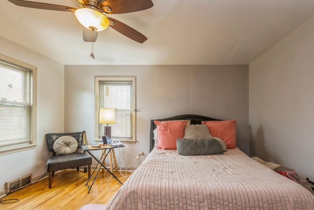 bedroom featuring ceiling fan and light wood-type flooring