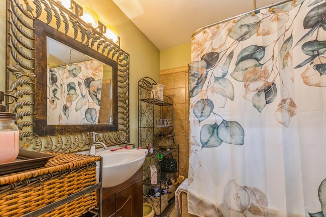 bathroom with vanity and a shower with shower curtain