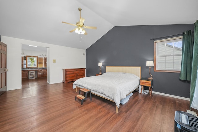 bedroom with wine cooler, vaulted ceiling, dark hardwood / wood-style floors, and ceiling fan