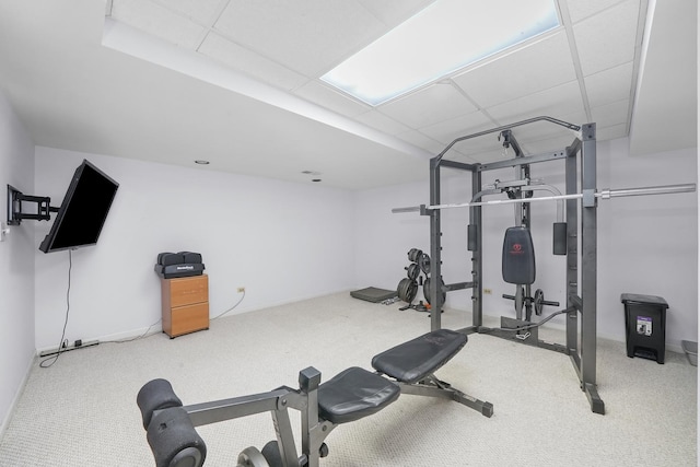 exercise area featuring a paneled ceiling