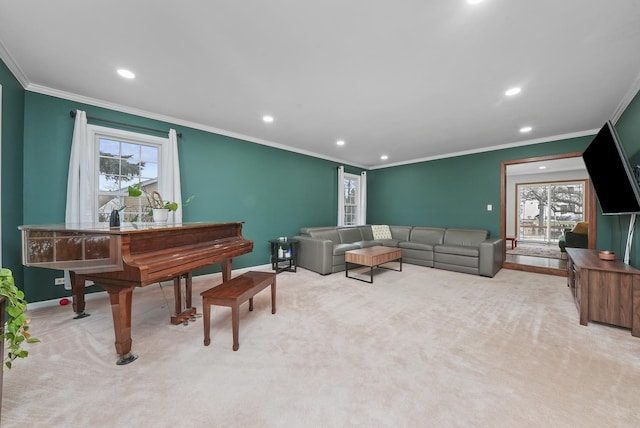 carpeted living room featuring ornamental molding and a healthy amount of sunlight