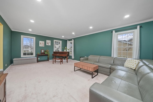 living room with ornamental molding and light carpet