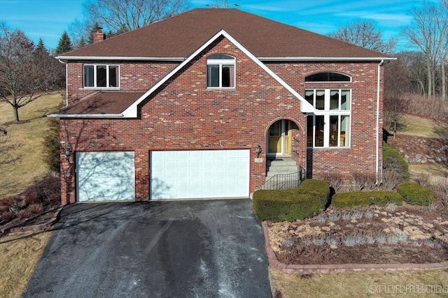 view of front of house with a garage