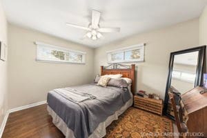 bedroom featuring dark wood-type flooring and ceiling fan