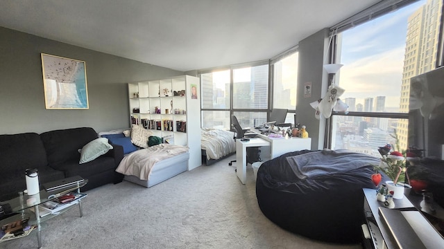 living room featuring a healthy amount of sunlight and light colored carpet