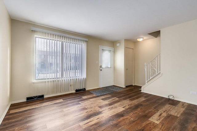 interior space featuring dark wood-type flooring