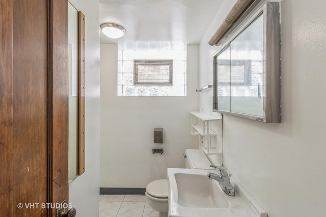 bathroom featuring sink and toilet