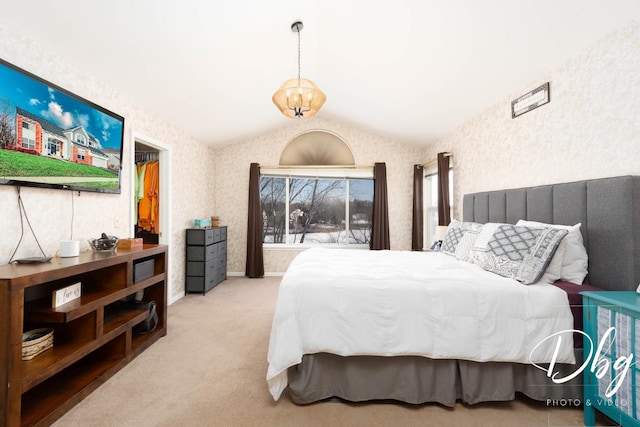 bedroom featuring vaulted ceiling, carpet, and wallpapered walls