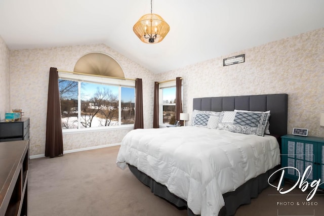 bedroom with wallpapered walls, baseboards, vaulted ceiling, and carpet flooring