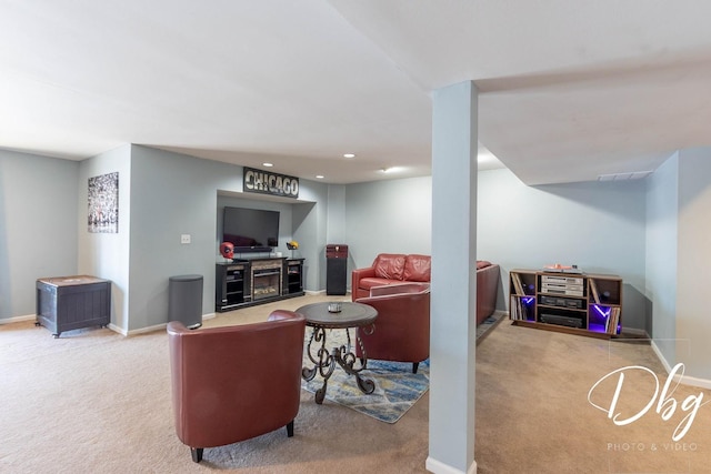 living room featuring carpet, visible vents, baseboards, and recessed lighting