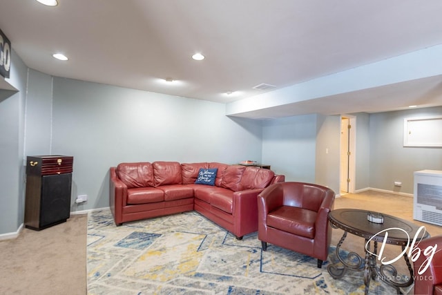 carpeted living room with baseboards, visible vents, and recessed lighting