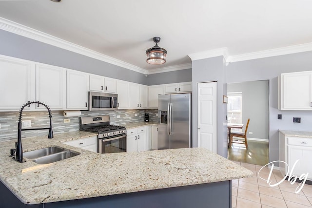 kitchen with light tile patterned floors, light stone counters, stainless steel appliances, crown molding, and a sink