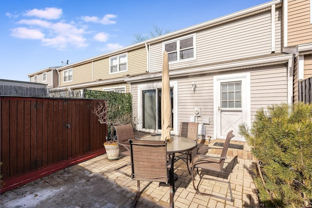 rear view of house featuring a patio