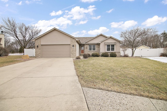 ranch-style home featuring a garage and a front lawn