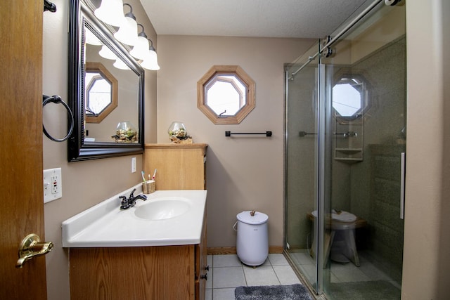 bathroom with plenty of natural light, toilet, and vanity