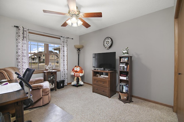 interior space with light carpet and ceiling fan