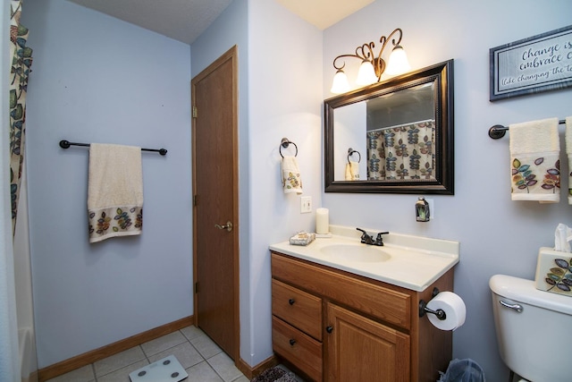 bathroom featuring a shower with shower curtain, vanity, toilet, and tile patterned flooring