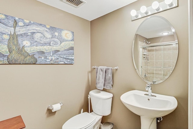 bathroom featuring sink and toilet