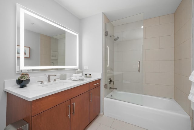 full bath featuring shower / bath combination with glass door, tile patterned flooring, and vanity