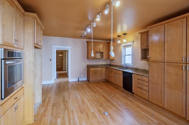 kitchen featuring black dishwasher, hanging light fixtures, stainless steel oven, light brown cabinets, and light wood-type flooring