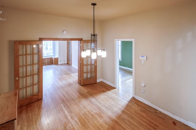 unfurnished dining area with light hardwood / wood-style floors