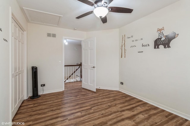 spare room featuring dark hardwood / wood-style floors