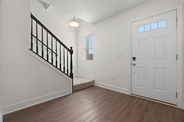 entrance foyer featuring dark wood-type flooring