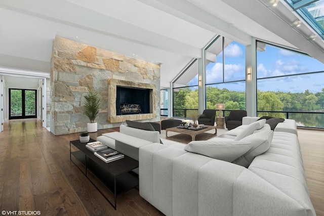 28 Brinker Rd, Barrington Hills, IL 60010 - living room featuring a stone fireplace, beamed ceiling, wood finished floors, and high vaulted ceiling