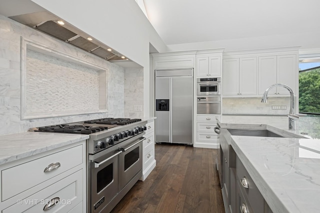 28 Brinker Rd, Barrington Hills, IL 60010 - kitchen with premium appliances, premium range hood, tasteful backsplash, and light stone countertops