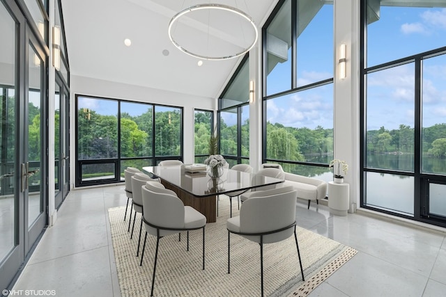 28 Brinker Rd, Barrington Hills, IL 60010 - sunroom / solarium featuring high vaulted ceiling, plenty of natural light, a water view, and floor to ceiling windows