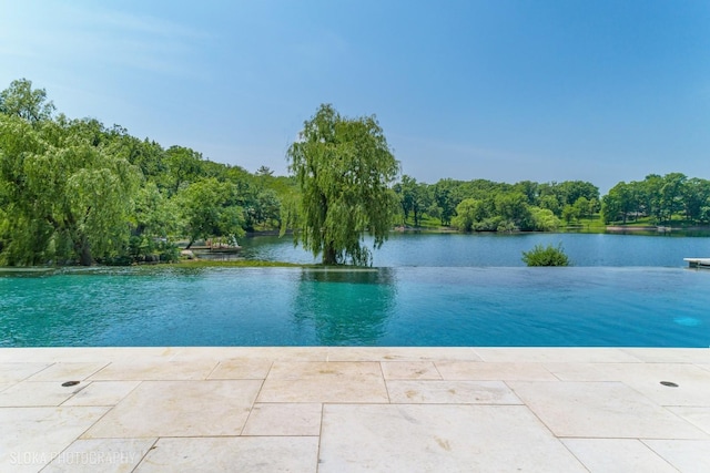 28 Brinker Rd, Barrington Hills, IL 60010 - view of pool featuring a water view
