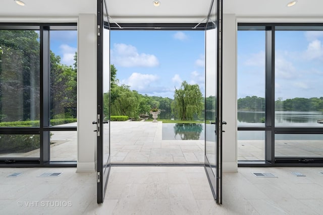 28 Brinker Rd, Barrington Hills, IL 60010 - doorway to outside featuring french doors, floor to ceiling windows, and healthy amount of natural light