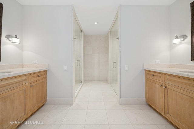 28 Brinker Rd, Barrington Hills, IL 60010 - full bath with two vanities, a stall shower, tile patterned flooring, and recessed lighting