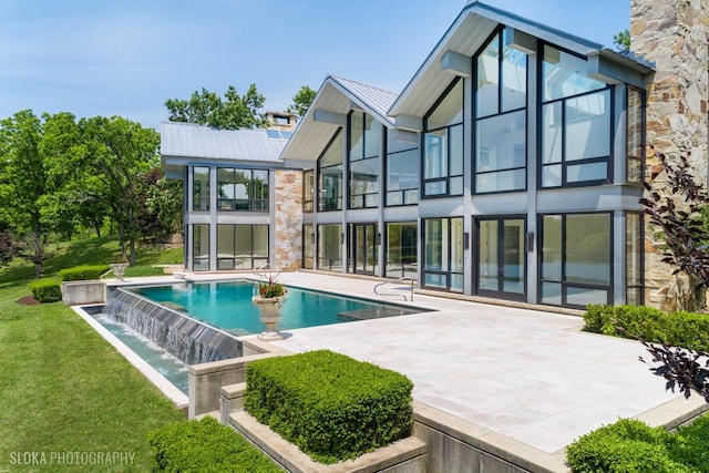 28 Brinker Rd, Barrington Hills, IL 60010 - back of property with a patio, a standing seam roof, a yard, an outdoor pool, and a metal roof