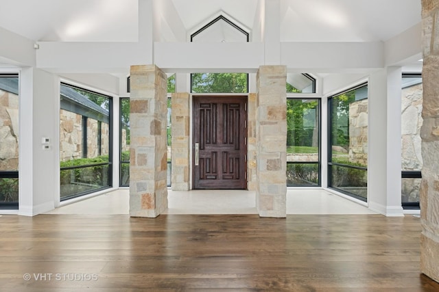 28 Brinker Rd, Barrington Hills, IL 60010 - entrance foyer with wood-type flooring, healthy amount of natural light, and lofted ceiling