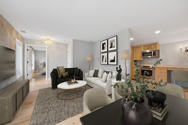 28 Brinker Rd, Barrington Hills, IL 60010 - living room featuring a chandelier, light wood-style floors, and recessed lighting