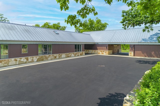 28 Brinker Rd, Barrington Hills, IL 60010 - view of front facade featuring stone siding and a metal roof