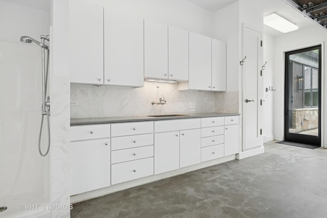28 Brinker Rd, Barrington Hills, IL 60010 - kitchen featuring white cabinetry, decorative backsplash, and carpet