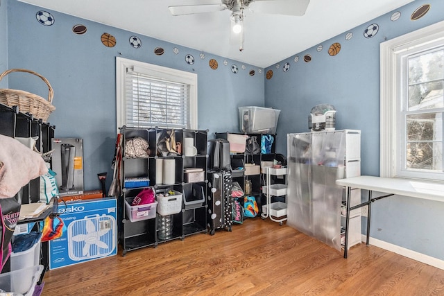 interior space featuring a ceiling fan