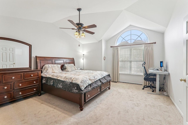 bedroom featuring light carpet, lofted ceiling, and ceiling fan